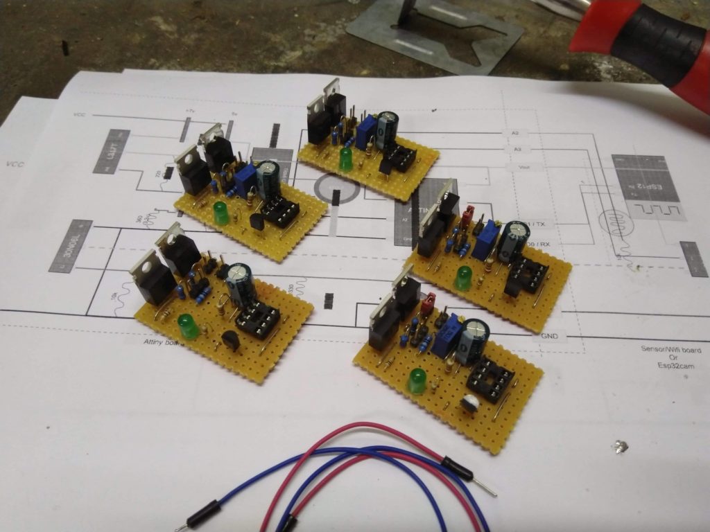 Five ATTiny85 boards with LM317's and MOSFETs