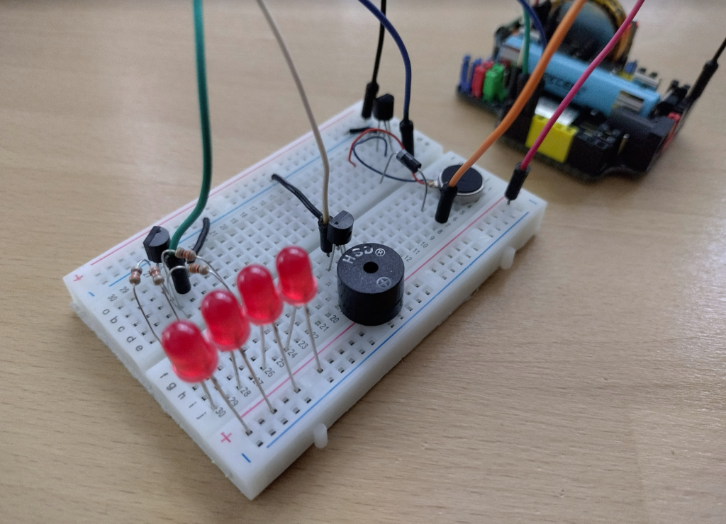 Deconstructed Pager / Beeper with leds, a beeper module, and a vibrating motor.