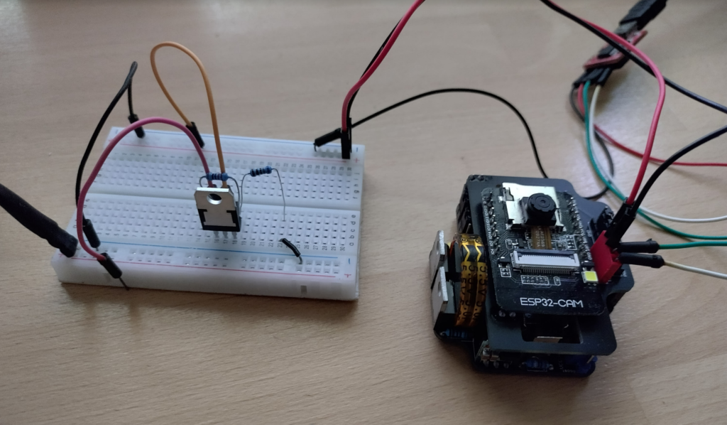 LM317T test rig, to see if we can suck as much current from it as possible by using an ESP32-Cam, two ATTiny85's, an ESP12f, and a whopping huge capacitor that needs charging.