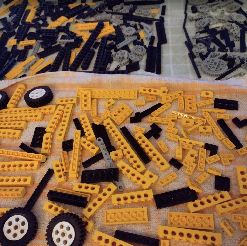 All the parts for the Lego Technic 8094 crane, washed and drying.