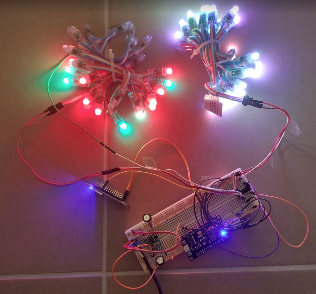 Two NodeMCU's using a single 5v switching supply, along with a single SN74HC125N