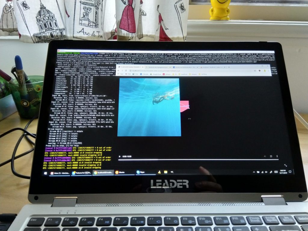 A laptop screen showing a short video rendering test, a result of a complex ffmpeg technique that allows a full layered video render to be built within a webpage.