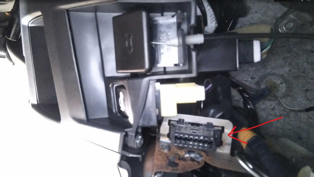 For those trying to locate where the OBD2/OBDII port is in an MX5 Miata NC 2006-2015, it's right next to the boot release button in the drivers side, pushed through a bit of the dashboard metal skeleton.