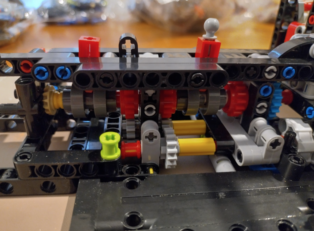 The transmission system showing the electric & petrol setup on a Mclaren P1 Technic set, represented by two red levers.